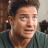 Static 48x48 pixel buddy icon showing a close-up of a person's face with brown hair and light skin, wearing a dark green shirt against an indistinct background.