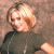 Static 50x50 pixel icon showing a person with light brown hair and dark clothing against a muted background, rendered in low-resolution pixel art style.