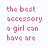 Pixelated pink text and symbols on a white background with a heart icon.