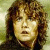 A pixelated image of a person with curly brown hair and light skin, accompanied by text fragments on white backgrounds.