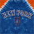 Pixelated blue and orange icon with stylized text and a small central figure, likely a character or symbol, against a gradient background.
