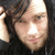 A pixelated image shows a person with long dark hair holding their hand near the head, next to bold white text on black background reading "BERT = SEXX".