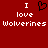 Red background with white pixelated text reading "I love Wolverines" and a black pixelated heart symbol replacing the word "love" in the center.