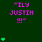 "ILY JUSTIN !!!" text in pink pixelated font with green heart symbols on dark green background; multiple instances of the phrase and hearts arranged across the frame.