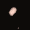 Animated sequence of light-colored, rounded shapes on black background with one gray rectangle, showing gradual size and form changes.