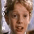 six pixelated character portraits with changing facial expressions and mouth positions, each bordered by vertical text