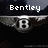 Pixelated image of a car's front grille with 'Bentley' text on left and '2011' on right, showing a reflection of the car's headlights.