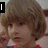 A child with light brown hair and red clothing appears in three with text overlays reading LOVE and DANNY<3