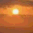 A 4-frame animated contact sheet showing a sunset scene with text about life on earth and the sun, arranged in a 2x2 grid.