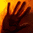 Animated contact sheet showing six frames of a hand-based animation with orange background and grayed-out elements, ending in stylized text.