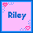 Pixel art icon with pink background and blue border displaying the name "Riley" in blue text, featuring animated heart symbols at top-left and bottom-right corners.