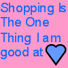 Pink background with blue text reading "Shopping Is Shopping Is The One Thing I am good at" and two blue heart symbols.