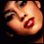 Animated sequence of a woman's face with red lips and dark eye makeup, showing head tilt and eye movement across frames.