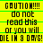 Yellow background with black text reading 'CAUTION!!! do not read this or you will DIE IN 8 DAYS!' repeated in a pattern