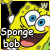 Yellow cartoon character with large blue eyes and pink mouth, smiling widely against black background with white dots.