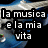 Pixelated image with blue and white background showing text 'la musica e la mia vita' in black rectangular blocks.