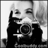 Black-and-white image of a person holding a camera with both hands, taking a photo; the right shows the flash firing