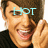 A person with brown hair and a black shirt smiles broadly, hand near face, with 'HOT' text overlaid in light blue on the forehead area.