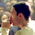Static 50x50 pixel buddy icon showing a close-up of a person's face with dark hair and light skin, wearing a white shirt against a blurred background.