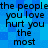 Blue pixelated background with black text repeating 'the people you love hurt you the most' in two vertical