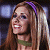 A 50x50 pixel animated contact sheet showing two frames of a cartoon-style character with long brown hair and purple headband on the left, next to green text reading "Original Icons .com" on a dark background.