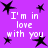 Purple background with black star shapes and repeated white text 'I'm in love with you' in pixelated font.