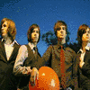 Six distinct Fall Out Boy group photos arranged in a , each showing members in various poses and settings with visible text "FALL OUT BOY" in the top-right