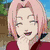 Pixelated anime-style character with pink hair and red clothing, shown in multiple poses with overlaid text about smiling through pain.