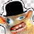 Pixelated character with black top hat, blue eyes, and orange-brown hair against white background.