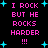 Pixelated text repeats 'I ROCK BUT HE ROCKS HARDER !!!' with cyan starbursts on black background, two identical vertical of text and stars