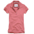 A static image of a pink polo shirt with visible text elements in pixelated magenta font surrounding it.