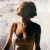 Pixelated image of a person with short hair in profile view against light background, next to green text reading Original Icons .com.