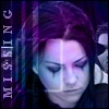 A static image of a person with closed eyes and purple hair, featuring vertical text on the left side.