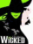 Green and black cartoon character with glowing eyes, white face, and 'WICKED' text on a green background.