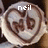 Circular icon with swirling brown and white patterns, displaying text above the swirls.