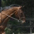 A pixelated image of a brown horse's head and neck in profile, facing right, with a dark background and green foliage elements.