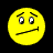 Static pixelated yellow smiley face icon with raised eyebrows and a sideways mouth on black background.