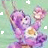 Animated buddy icon featuring a purple cartoon character with large eyes and a yellow circular chest emblem, set against a light green background with scattered white squares.