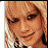 six pixelated images showing a person with blonde hair and dark eye makeup, overlaid with red X marks and the word "FAKE" in bold black text