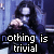 identical animated frames showing a person with long dark hair and glasses in front of a blue background, with text reading "nothing is trivial" below