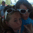Two people in a pixelated photo with sunglasses on a black background, text reads 'Girls Just Wanna HAVE FUN =]' in pink.