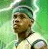 Pixelated image of a person with brown skin wearing a green cap and light-colored shirt against a green background.