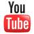 Pixelated YouTube logo with 'You' above a red 'Tube' button on a white background with faint colored pixels.