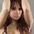 A four- shows a woman with long red hair in different poses, with a yellow containing text