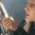 A split-screen image shows a person holding a sword on the left and close-up facial features on the right, with text below reading "Legsie is MINE!".