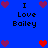 Blue background with pixelated text "I Love Bailey" and heart symbols in red and purple, arranged in a pattern