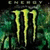 Green and black Monster Energy logo with dripping effect on textured background, displayed in a