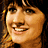 A 3x3 contact sheet of sampled frames from an animated icon featuring a woman with brown hair and bangs in various facial expressions, displayed on a gray background.