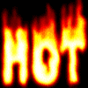 Flaming text "HOT" repeated in two on a black background with orange and yellow fire effects