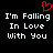 Black background with white pixelated text reading "I'm Falling In Love With You" and a red heart symbol above the left side of the text.